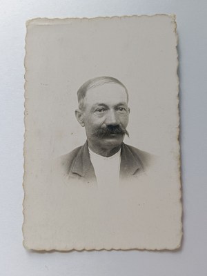 PHOTO OF A MAN WITH A MUSTACHE, PRE-WAR