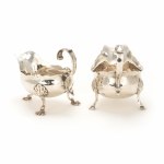 Pair of George II and III silver cream jugs