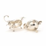 Pair of George II and III silver cream jugs