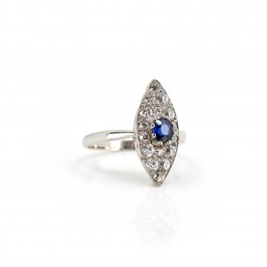 Shuttle ring with diamond and sapphire setting