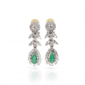 Pair of clip earrings with emerald diamond setting