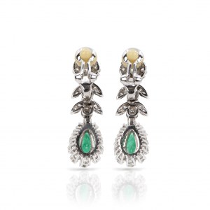 Pair of clip earrings with emerald diamond setting