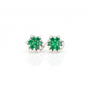 Pair of clip earrings set with emeralds and diamonds