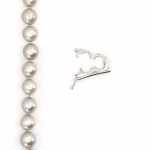 Cultured pearl necklace with diamond clip