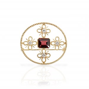 Brooch with garnet diamond trimming