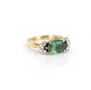 Ring with tourmaline diamond setting
