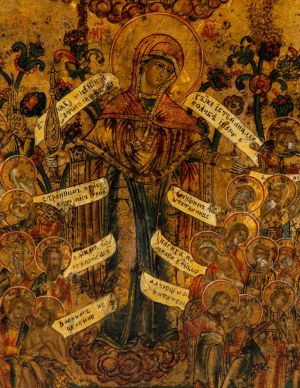 Russische Ikone, die eine Madonna mit einer Synaxis von Heiligen darstellt