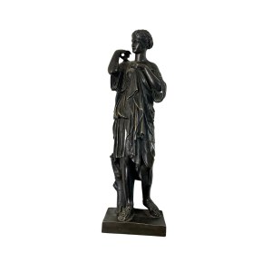 Sculpture: Woman in Roman attire.
