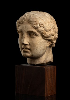 Stone head in Roman style