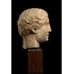 Stone head in Roman style