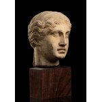 Stone head in Roman style