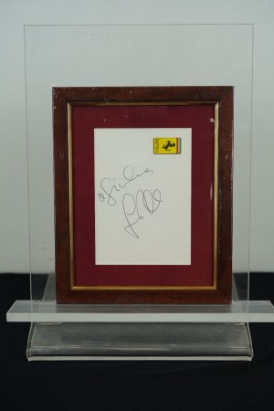 LUCIO DALLA AUTOGRAPH WITH DEDICATION ON FERRARI PAPER