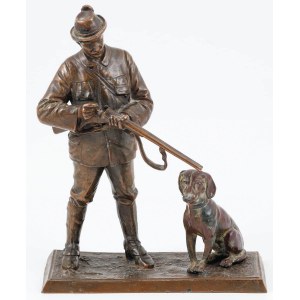 a hunter with a dog, circa 1900.