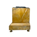 Yellow marble clock.
