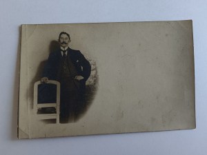 PHOTO OF A MAN WITH A CIGARETTE, CIGARETTE, BY A CHAIR, PRE-WAR