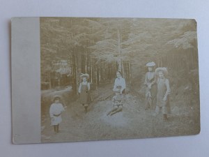 PHOTO A GROUP OF PEOPLE IN A FOREST, PRE-WAR