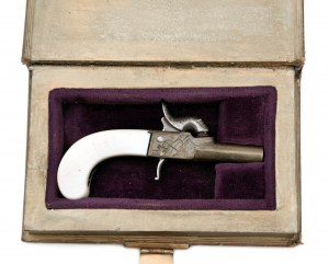 Miniature of a percussion pistol stored in a box in the form of a book
