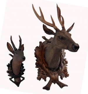 Wooden carved head of a roe deer and a doe