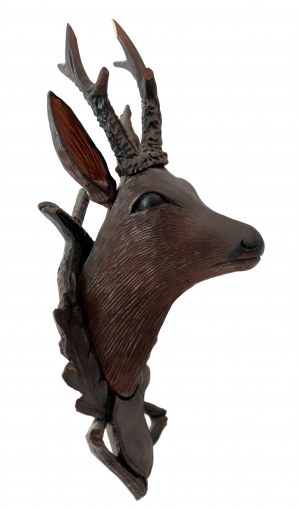 Wooden carved head of a roe deer and a doe