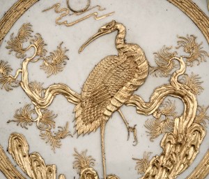 Porcelain plate with embossed decoration