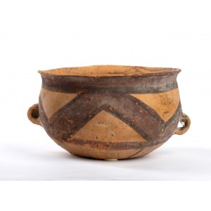A PAINTED CERAMIC BOWL