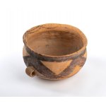 A PAINTED CERAMIC BOWL