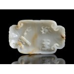 A SMALL WHITE AND RUST JADE TRAY