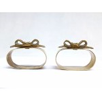 A pair of decorative napkin rings