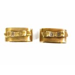 A pair of decorative napkin rings