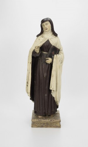 Statue of an unspecified saint with a book