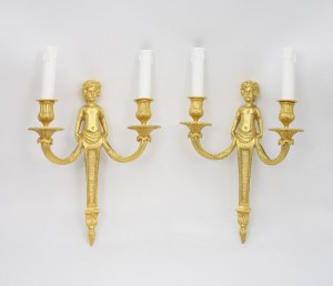 A pair of double arm wall sconces in the style of the Second Empire