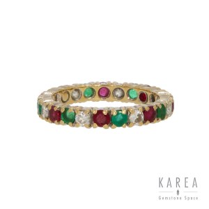 Eternity ring with precious stones, 20th century.