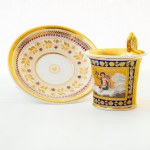 Cup and plate in polychrome porcelain,