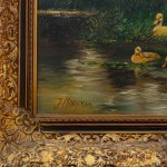 Glimpse of river with ducks and trees
