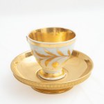Lot of two polychrome porcelain coffee cups with saucer,