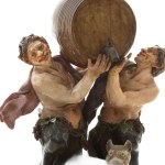 Satyrs with barrel and leopard, polychrome porcelain group,
