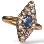 Złoty pierścionek 585 z szafirem (0,60 ct) i diamentami rozetowymi