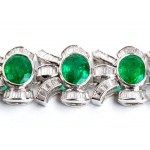 Bracelet en or avec lignes d'émeraudes et rubans de diamants