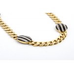 Long gold necklace with black enamel and diamonds