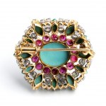 Gold brooch with turquoise, rubies, and diamonds