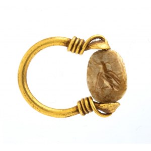 Archaeological-style ring set with engraved stone