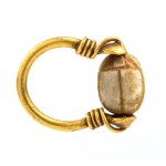 Archaeological-style ring set with engraved stone