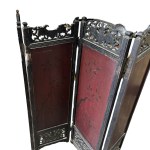 Ebonized and pierced wooden room divider