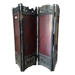 Ebonized and pierced wooden room divider