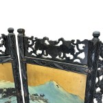 Ebonized and pierced wooden room divider
