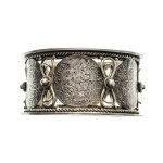 Silver serviette with 17th century 3-carat coins, German workshop after 1884.