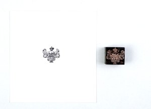 Decorative motif. Film form. 2.3x2.3 cm on a metal base.