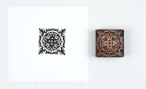 Decorative motif with cutouts. Cloth form. 4x4 cm on a metal base.