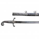 Turkish parade saber with silver handle and scabbard, 19th century in the kilij style.