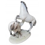Huge porcelain figure of a group of horses by H. Meisel